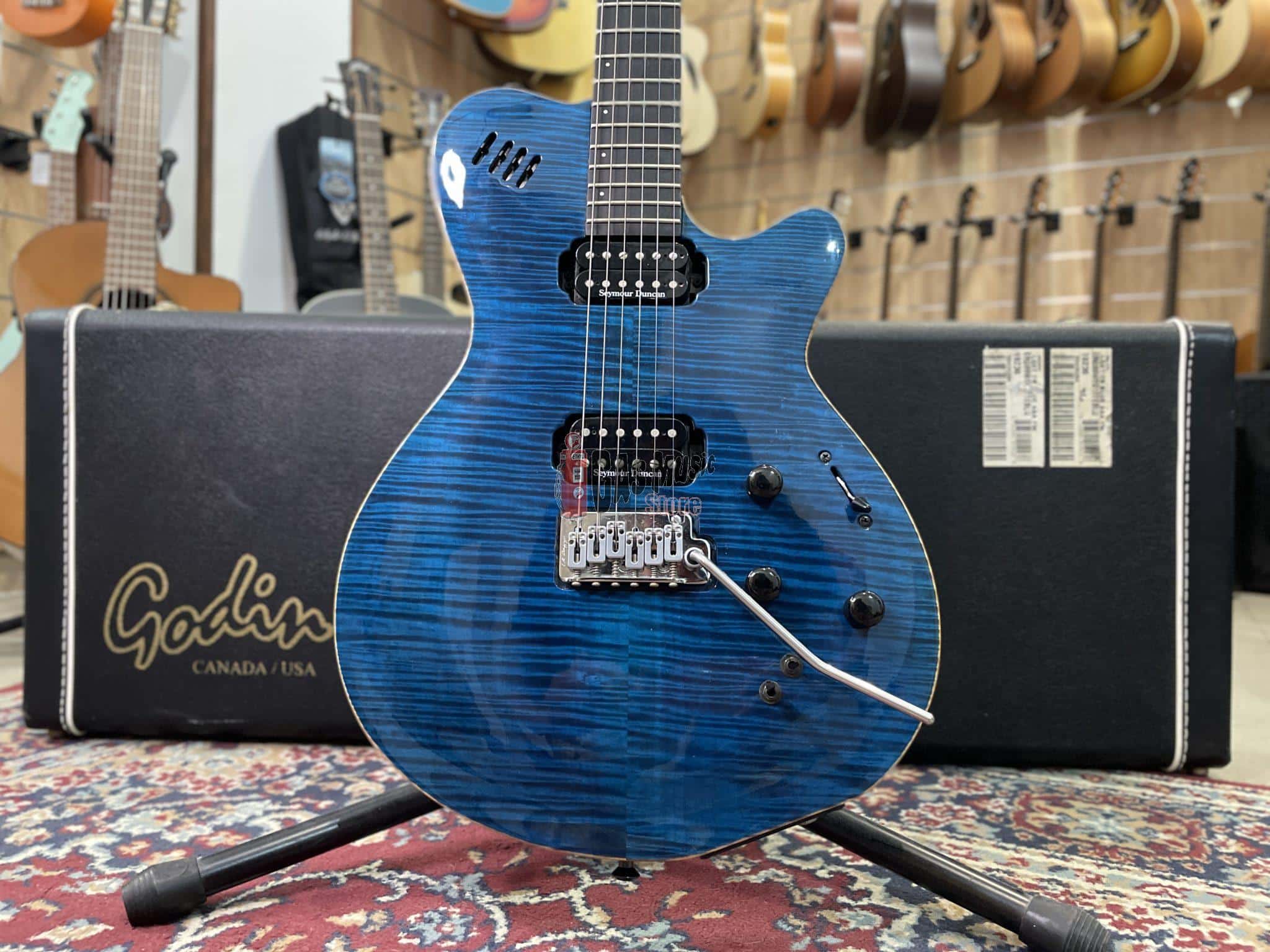 Godin LGXT Trans Blue Flame AAA | Gas Music Store - Permute on line